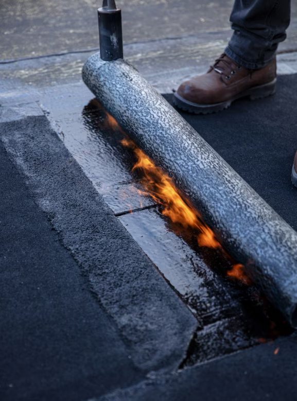 Why Flat Roofs Pond — and What to Do About It — What to Expect