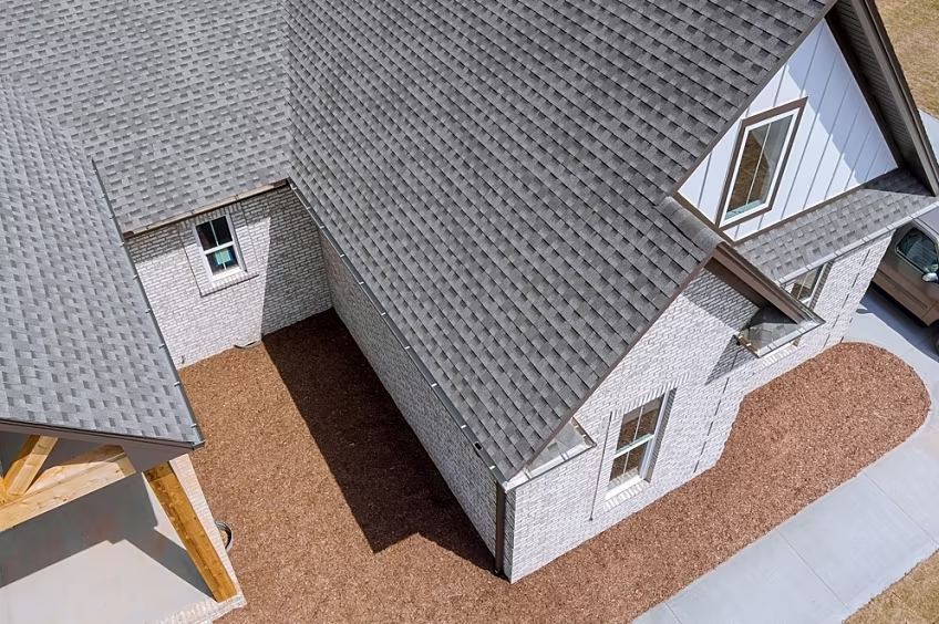 What a Shingle Re-Roof Costs in Universal City — The Short Answer